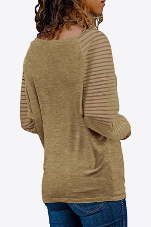 Striped sleeve raglan v-neck top in Olive Brown with horizontal sleeve stripes.