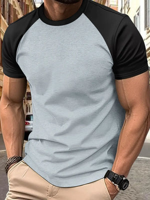 Colorblock raglan tee in gray and black with short sleeves and crew neck.