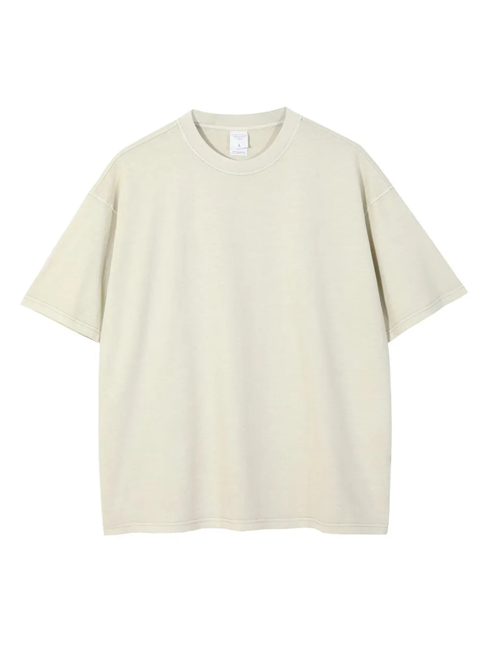 Oversized washed cotton tee in beige with a relaxed fit and crew neck.