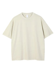 Oversized washed cotton tee in beige with a relaxed fit and crew neck.
