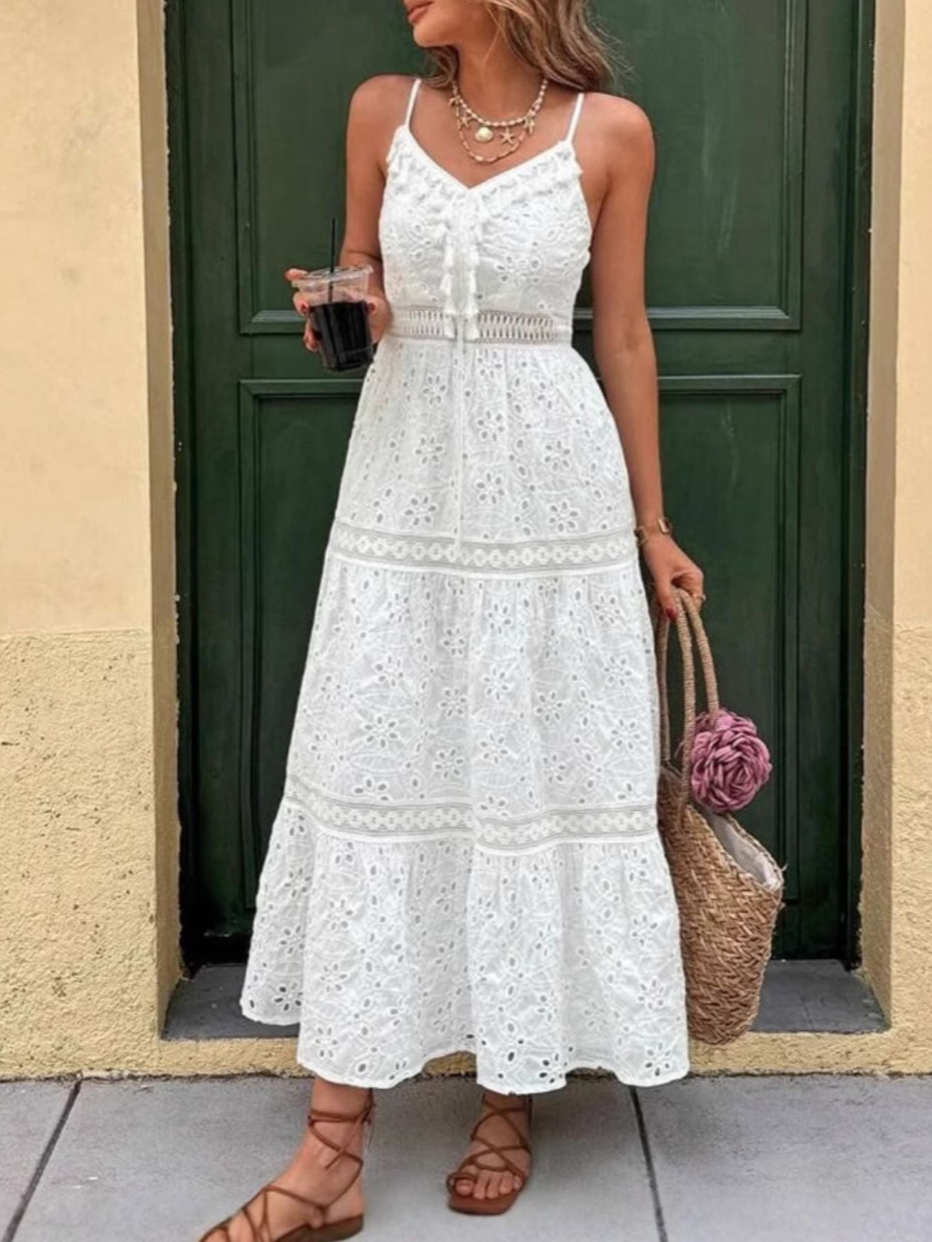 White eyelet embroidered cami maxi dress with lace trim and tiered skirt.