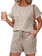 Khaki ruffled sleeve two-piece set with drawstring shorts and textured fabric.