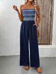 Striped bandeau palazzo jumpsuit in dark blue with wide legs and pockets.