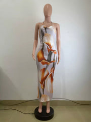 Maxi dress with cowl neck, floral print, and body-skimming fit.