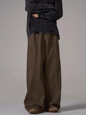 Brown wide-leg sweatpants with pockets and contrast stitching detail
