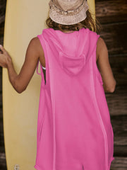 Sleeveless hooded romper in hot pink with raw edges and a pocket detail.