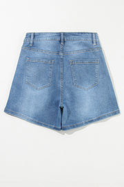 Embellished denim cuffed high-rise shorts in medium wash with back pockets.