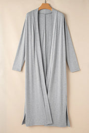 Gray duster cardigan with long sleeves and side slits, perfect for loungewear.