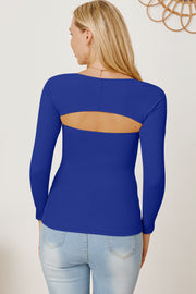 Royal blue long sleeve bodysuit with open back detail.