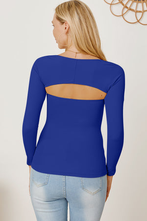 Royal blue long sleeve bodysuit with open back detail.