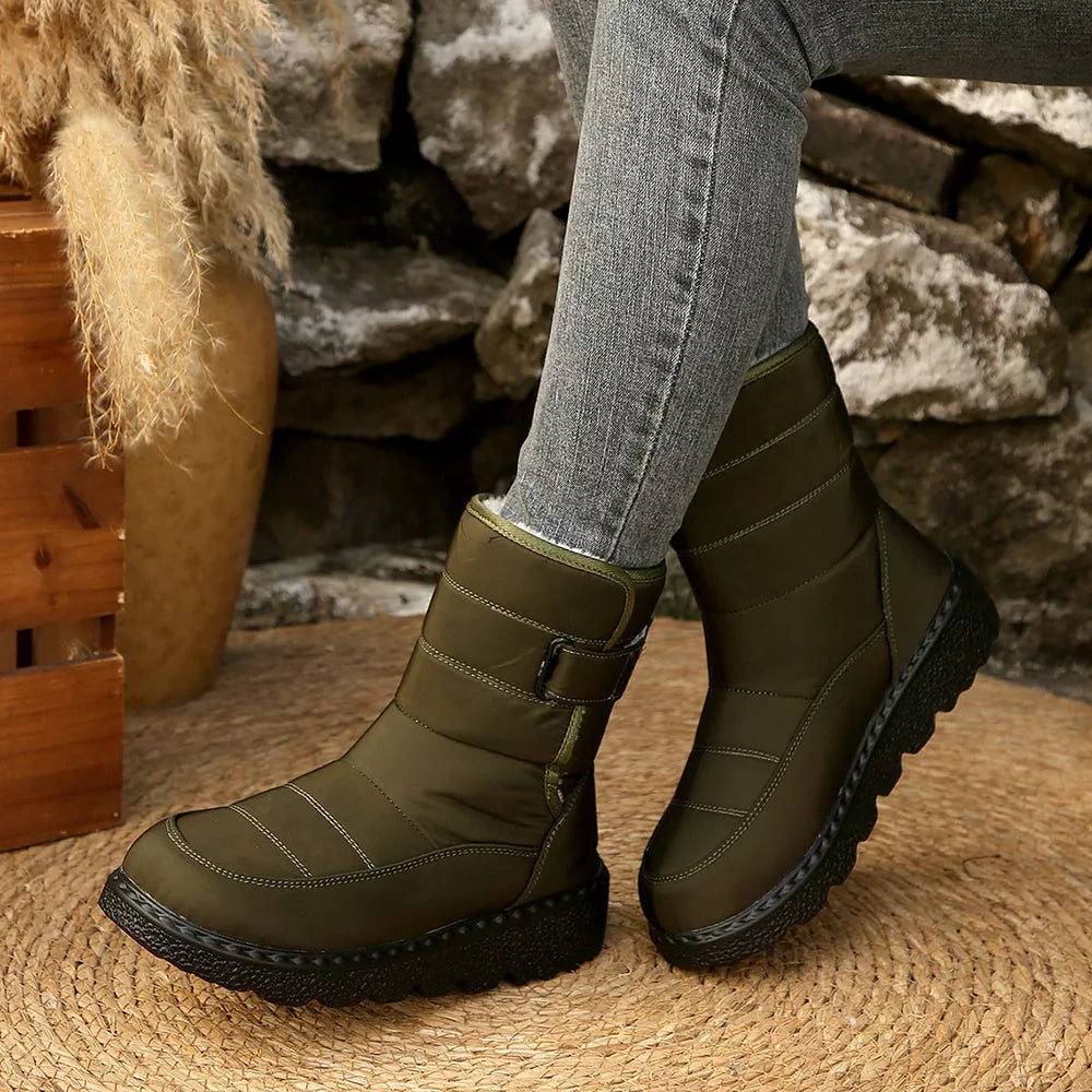 Green quilted round toe platform boots with adjustable strap and chunky sole.