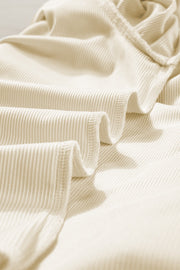 Textured eggshell ribbed blouse with ruffle sleeve detail
