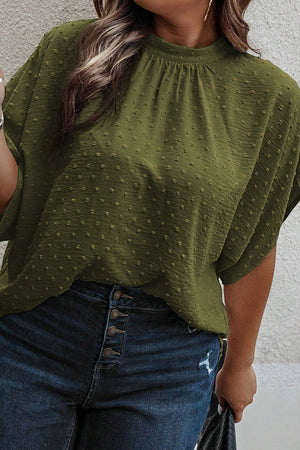 Matcha green textured Swiss dot blouse with mock neck and short sleeves