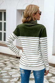 Colorblock stripe turtleneck knit sweater with army green and white horizontal stripes.
