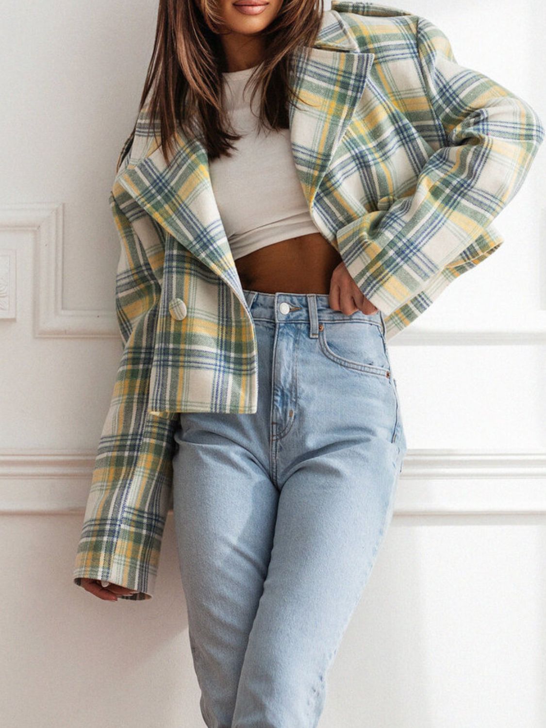 Boxy plaid cropped blazer in yellow, green, and blue with a notched lapel and single button closure.