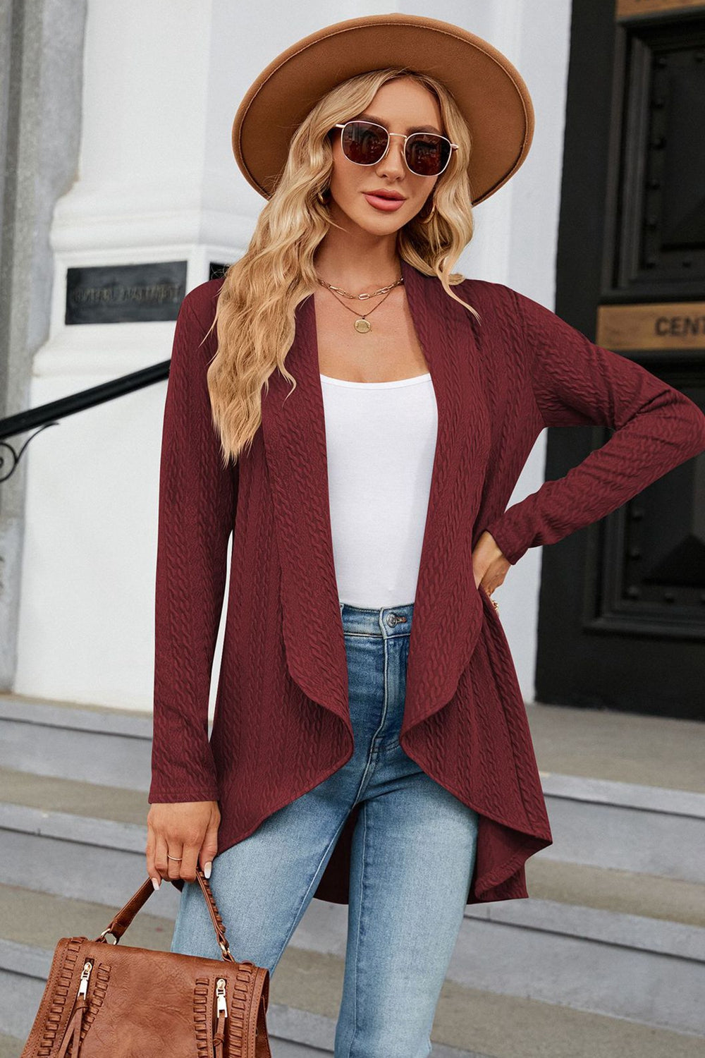 Drape-front cable knit cardigan in Wine with a textured pattern and open front.