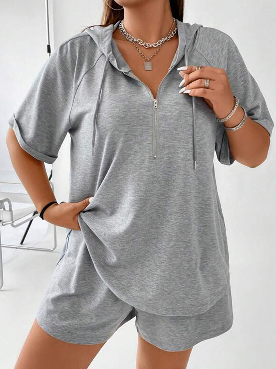 Gray short sleeve zip hoodie and shorts set with drawstring hood