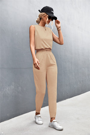 Khaki cropped muscle tank and jogger set with elastic waistband and cuffs.