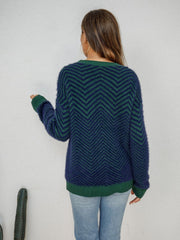 Chevron knit fluffy sweater in navy and green with crew neck and long sleeves.