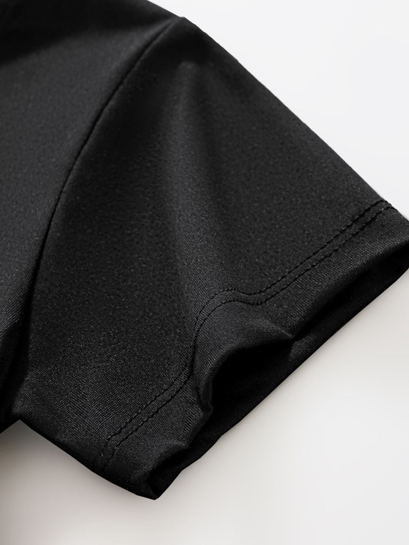 Black toddler t-shirt sleeve detail with double stitching.