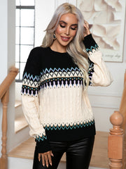 Black geometric Fair Isle cable knit sweater with cream sleeves and neckline detail