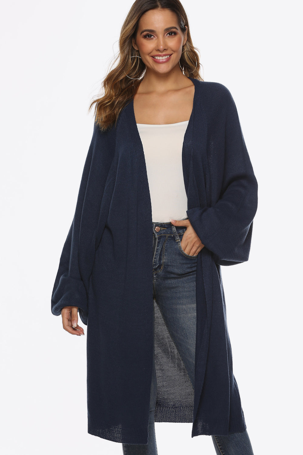 Dark blue oversized sleeve maxi knit cardigan with an open front and ribbed cuffs.