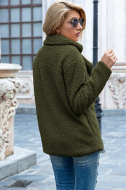 Army green teddy pea coat with a double-breasted closure and a plush texture.