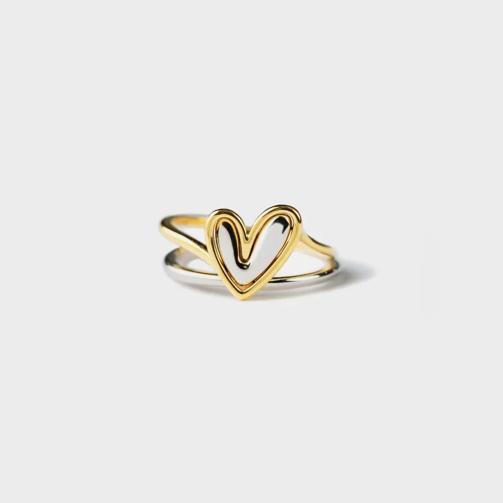 Gold two-tone heart outline ring with a double band design.