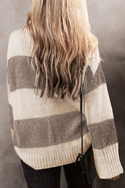 Relaxed knit sweater in mocha and cream stripes with ribbed cuffs and hem.