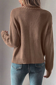 Taupe knit cardigan with mesh detail on sleeves and ribbed cuffs.