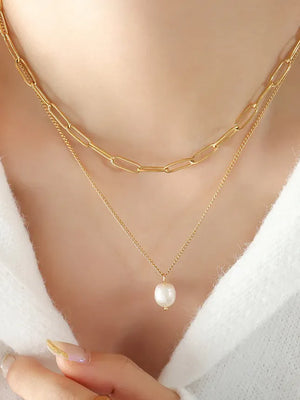 Gold layered necklace with paperclip chain and pearl pendant