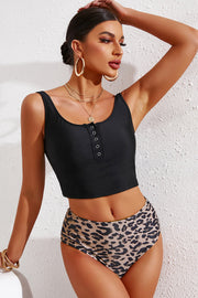 Black button-front tankini top with leopard print high-waist bottoms