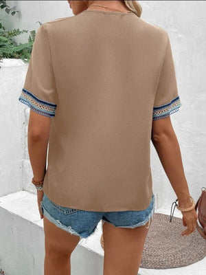 Mocha V-neck top with embroidered trim on short sleeves