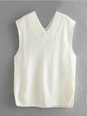 White textured knit vest with V-neck and asymmetric hem
