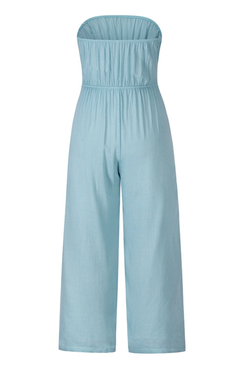Light blue bandeau jumpsuit with smocked bodice and wide-leg pants.