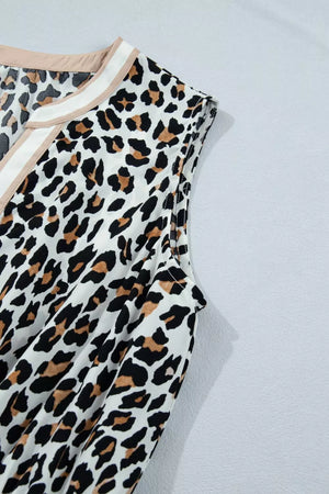 Leopard print midi dress with colorblock neckline detail.