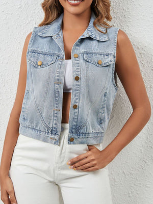 Light wash denim cropped sleeveless jacket with button-down front and chest pockets.
