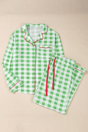 Light green gingham pajama set with red trim, collared long sleeve top and drawstring pants.