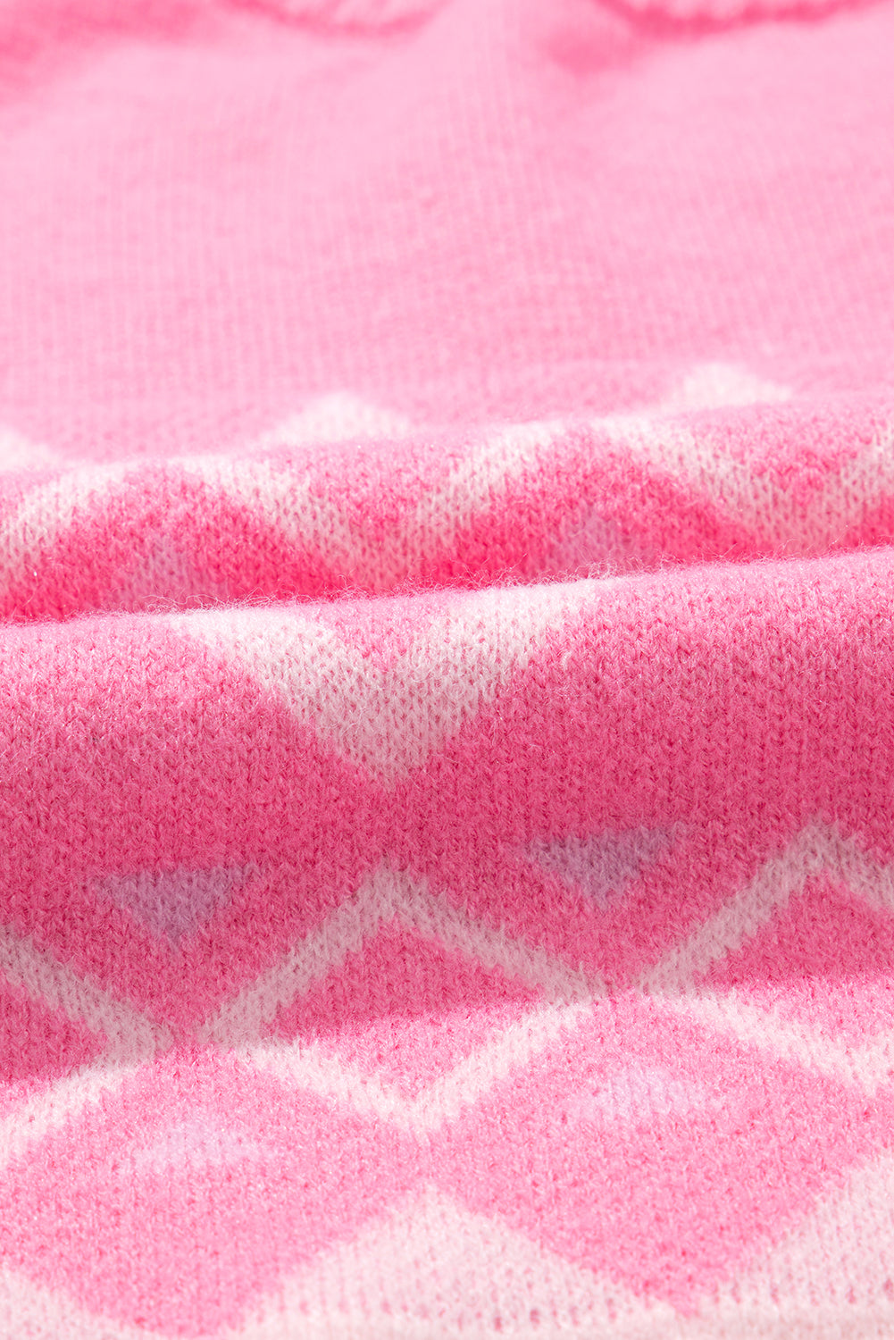 Pink acrylic knit sweater with geometric pattern detail