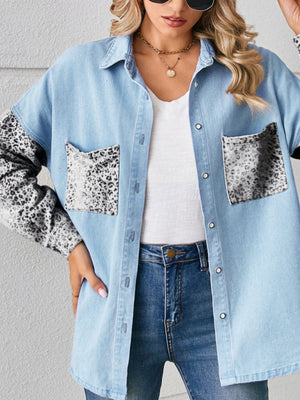 Denim button-up shirt with leopard print pockets and sleeves.