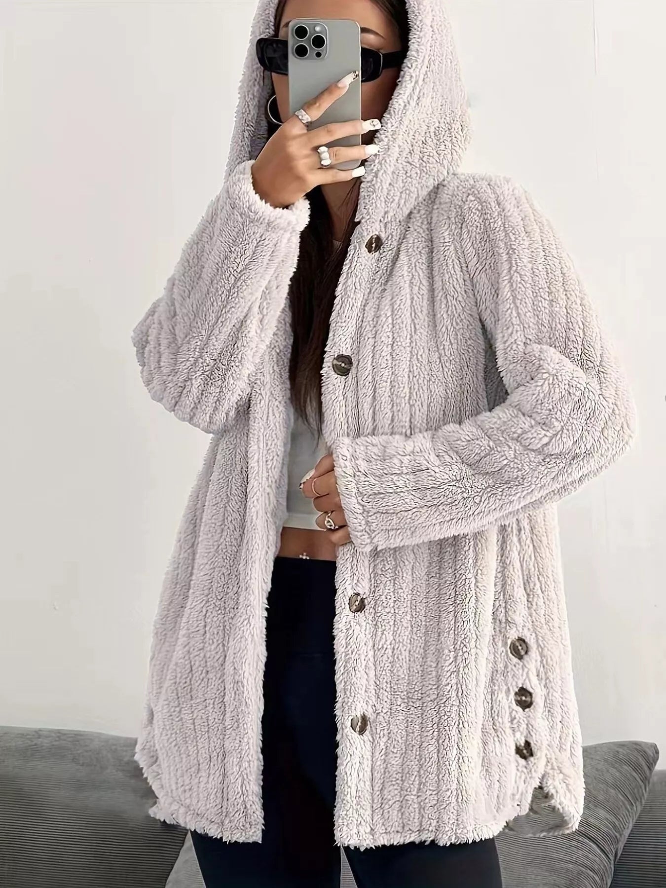 Light grey button-up fleece jacket with hood and textured fabric