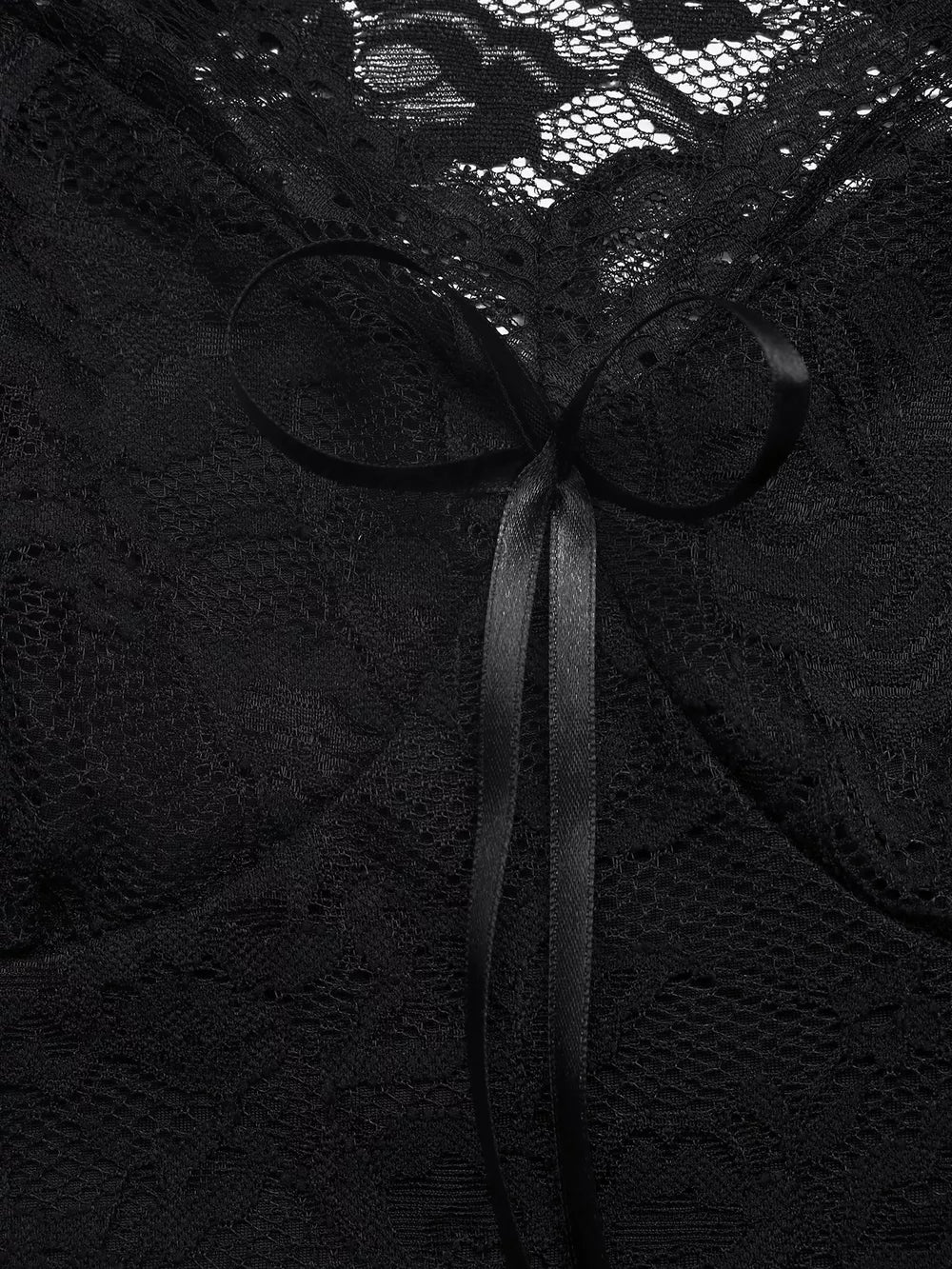 Black lace t-shirt with a satin bowknot detail at the neckline.