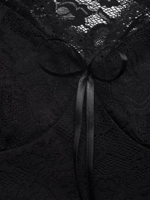 Black lace t-shirt with a satin bowknot detail at the neckline.