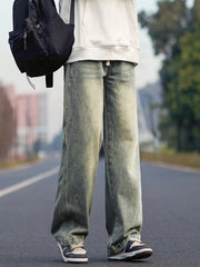 Relaxed fit 100 cotton jeans in a light wash with a drawstring waist.
