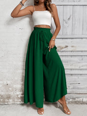 Ruffled waistline palazzo trousers in dark green with a drawstring and wide leg.