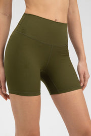 Army green ribbed contour active bike shorts with a high waist.