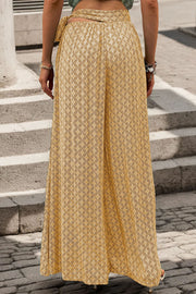 Yellow geometric print wide-leg palazzo trousers with a wrap detail at the waist.