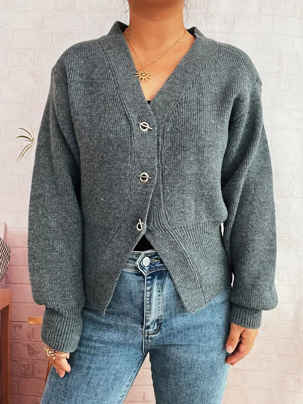 Gray ribbed V-neck button-through cardigan with silver hardware details