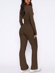 Brown ribbed loungewear set with long sleeves and flared pants.