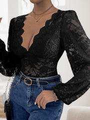 Black lace bodysuit with scalloped plunge neckline and long sleeves.